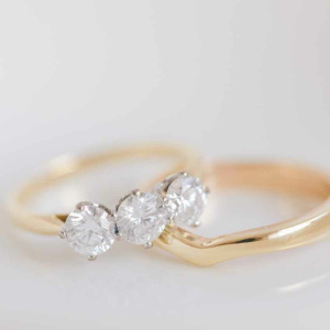 Sentimental Gold Lined Wishbone Wedding Ring