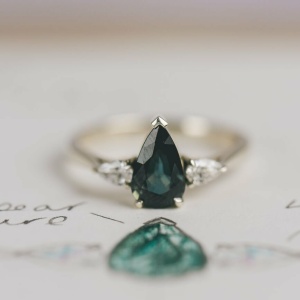 Pear Cut Teal Sapphire and Diamond Trilogy Engagement Ring