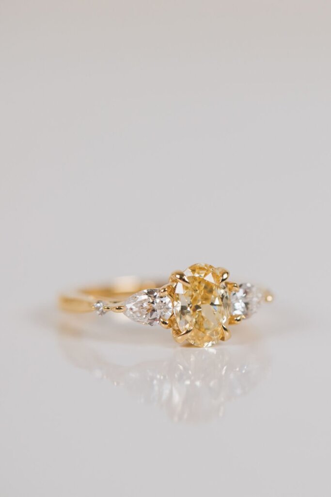 White and Yellow Five Diamond Engagement Ring Inspired by Paris