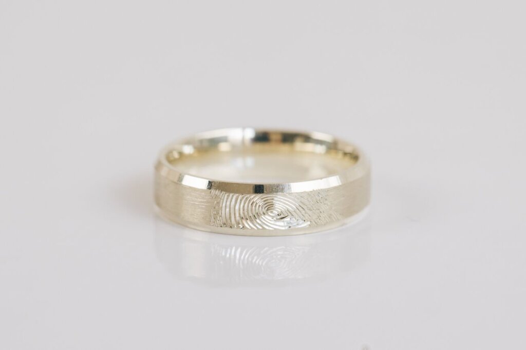 Finger Print Engraved Bevel Edged Raw White Gold Wedding Ring