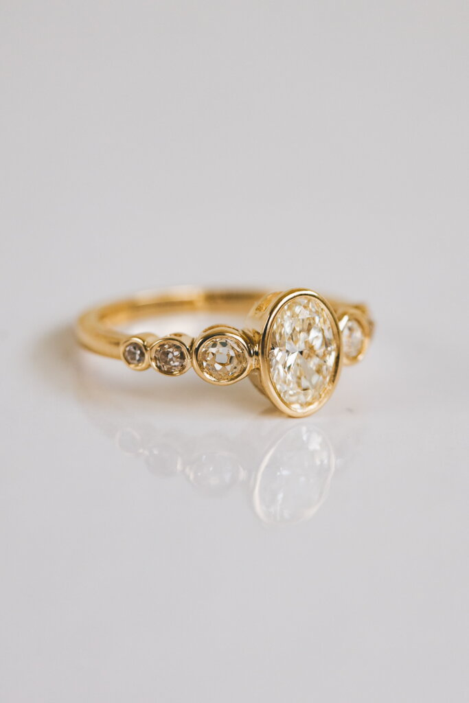 Oval and Old Cut Diamond Seven Stone Engagement Ring