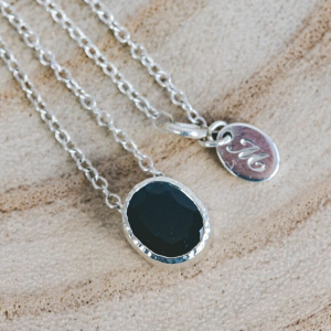 Oval Sapphire Pendant set in Hammered Silver with Engraved Tag