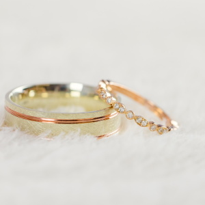 His and Hers White and Rose Gold Wedding Bands